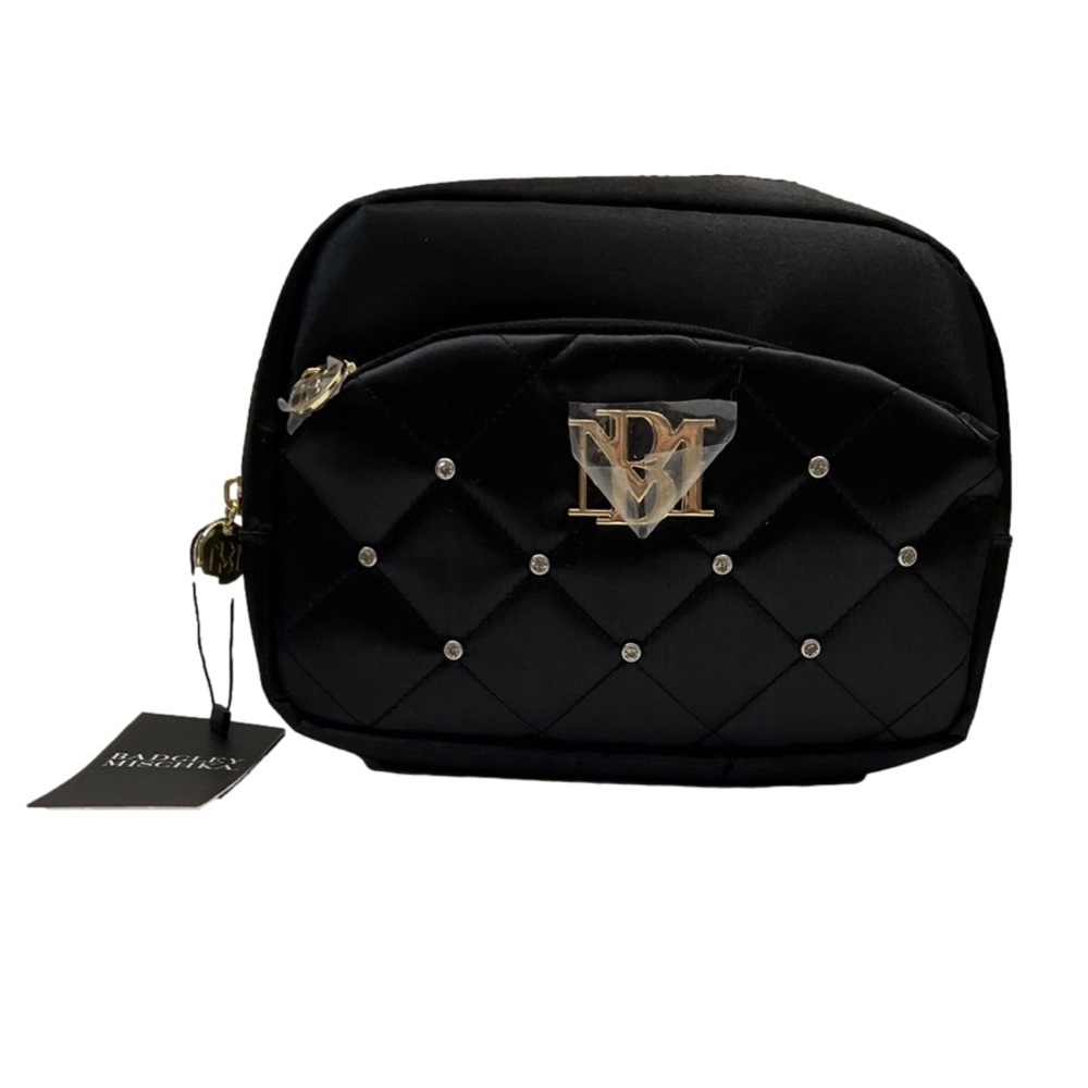 Badgley Mischka cosmetic bag includes travel bottle